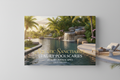 Luxury poolscape lookbook PDF cover with resort-style pool and waterfall